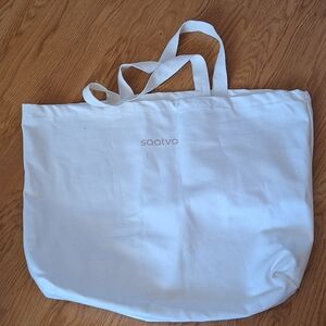 Saatva large canvas bag.